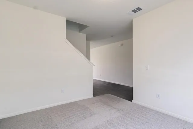 a view of an empty walk in closet