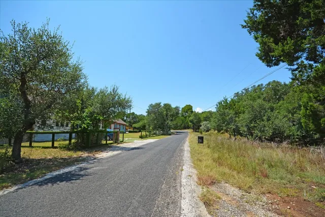 a view of a lake with a big yard