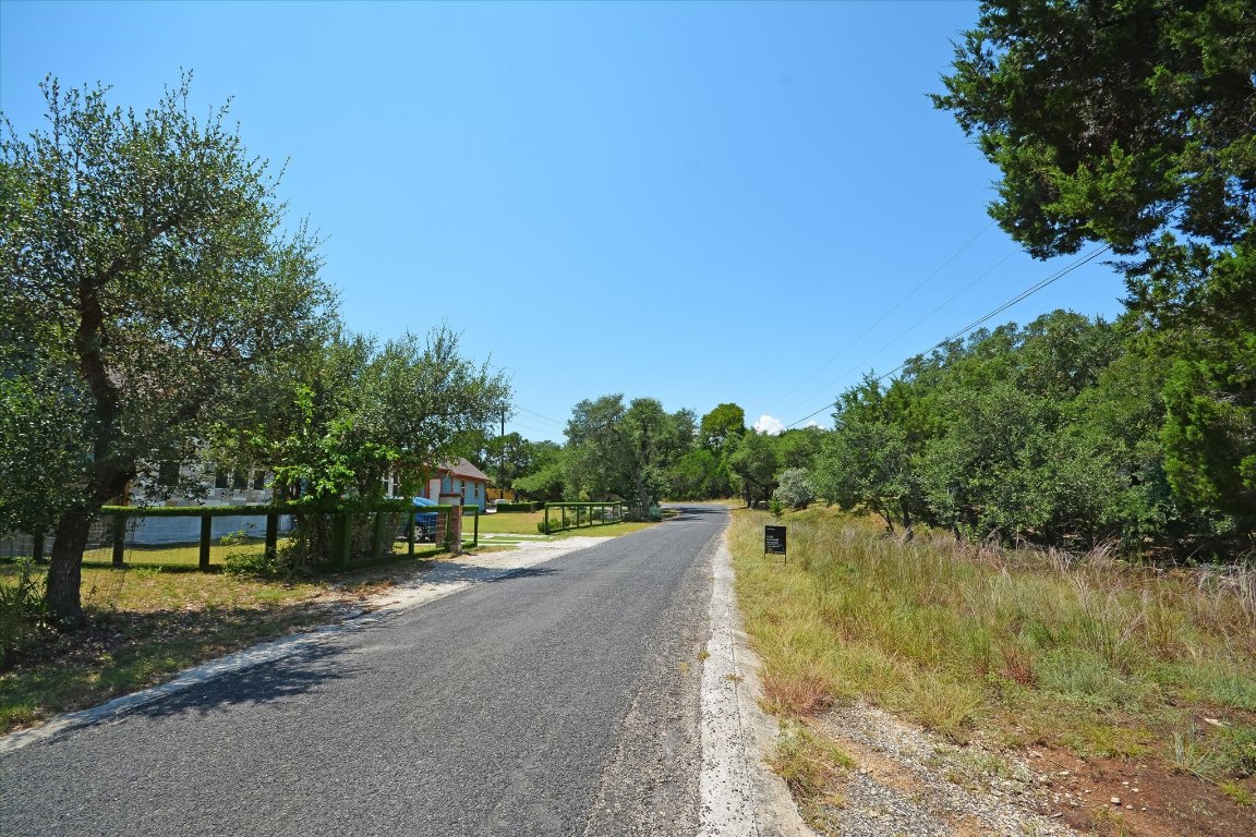 16 West El Camino Real Wimberley, TX 78676 - Photo 9 of 12 a view of a lake with a big yard