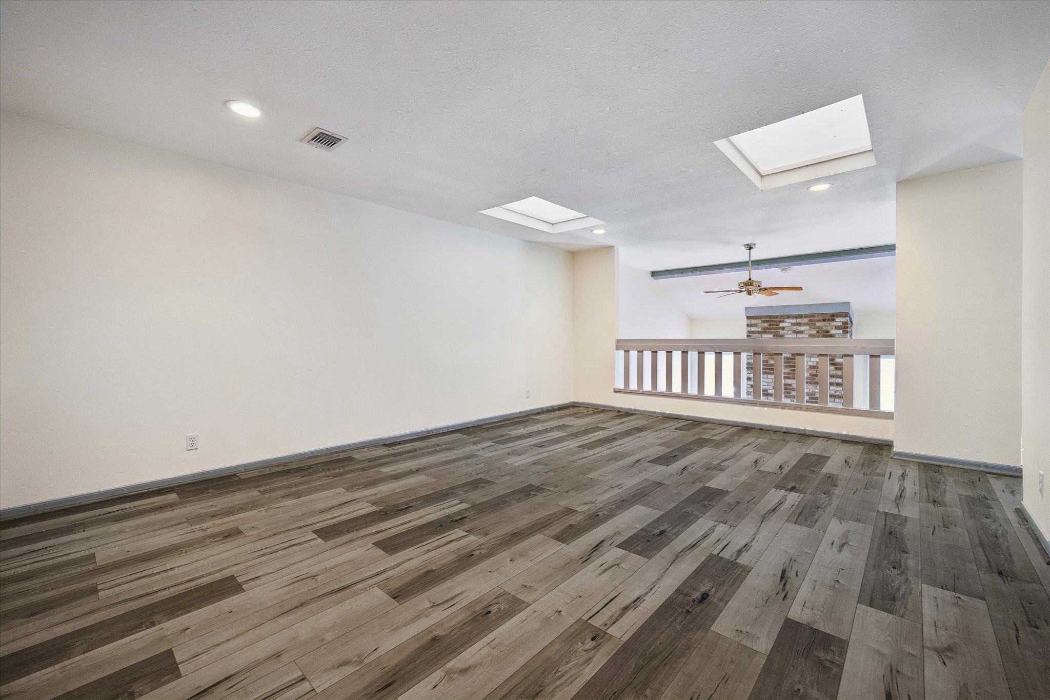 727 Bunker Hill Road, Unit 92 Houston, TX 77024 - Photo 23 of 50 SPACIOUS GAME ROOM LOFT WITH SKYLIGHTS OFFERING NATURAL LIGHT!
