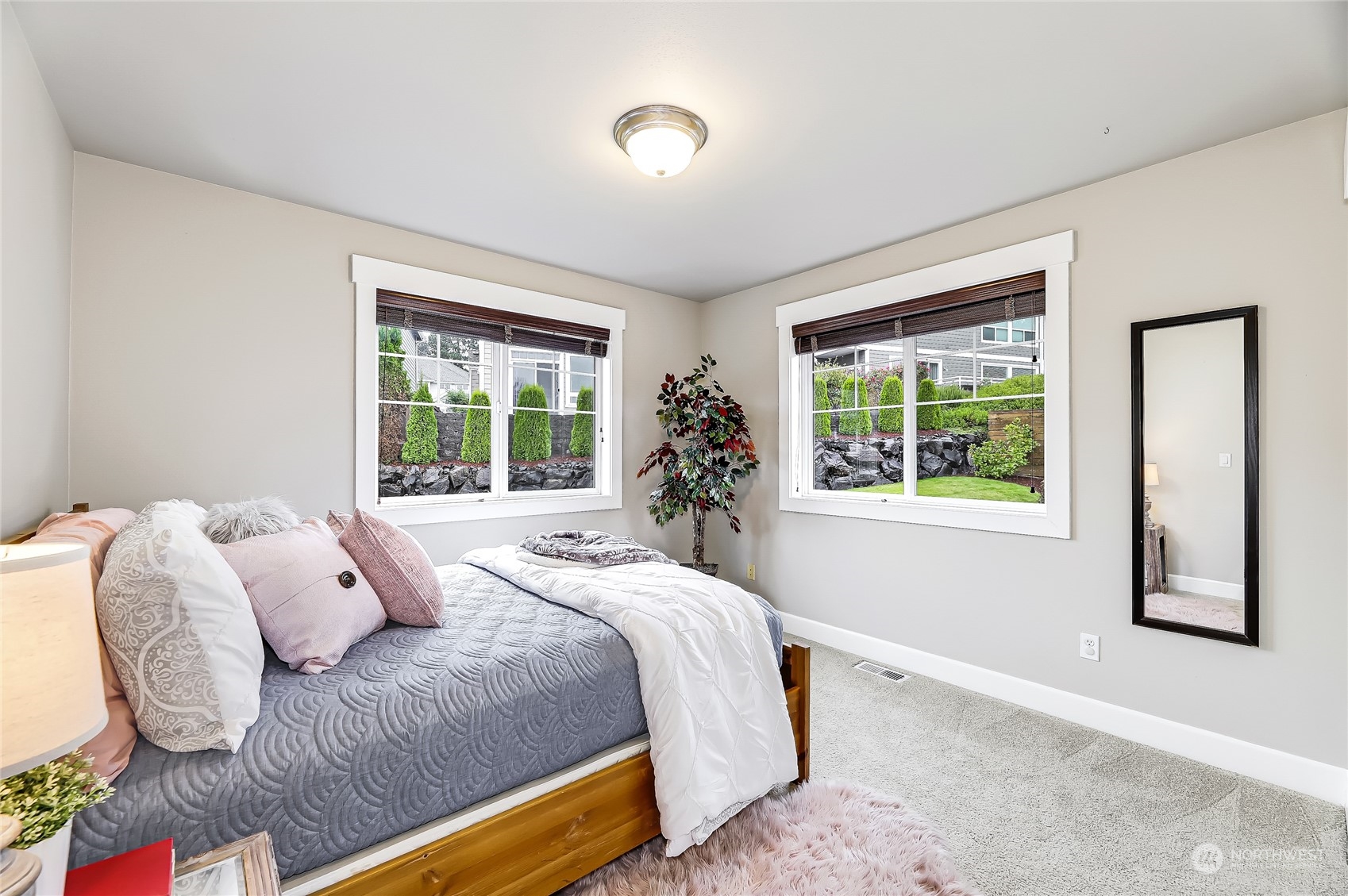 2712 Williams Avenue North Renton, WA 98056 - Photo 23 of 36 a bedroom with a bed and a window
