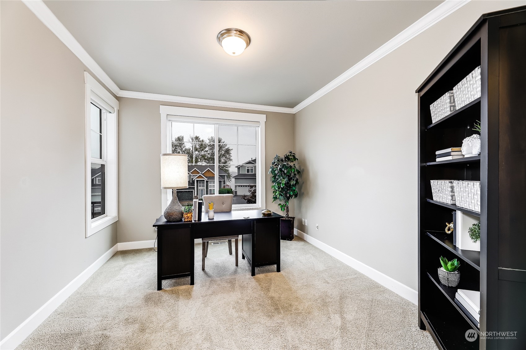 2712 Williams Avenue North Renton, WA 98056 - Photo 24 of 36 a view of a workspace with furniture and a window
