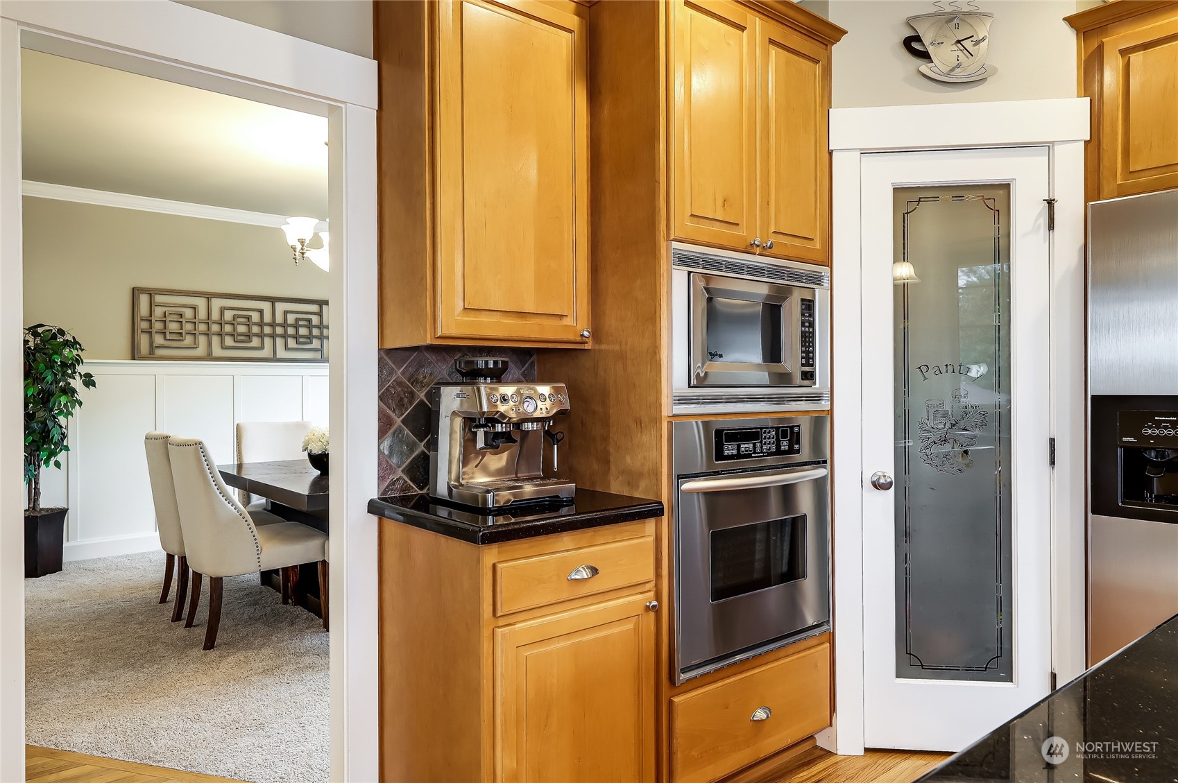 2712 Williams Avenue North Renton, WA 98056 - Photo 10 of 36 a kitchen with stainless steel appliances granite countertop a stove and a refrigerator