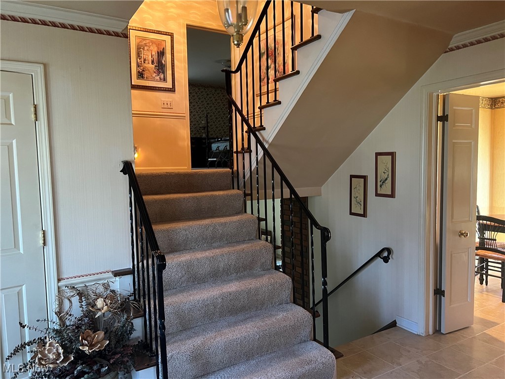 3330 Stanley Road Akron, OH 44333 - Photo 12 of 22 Stairs with tile patterned flooring