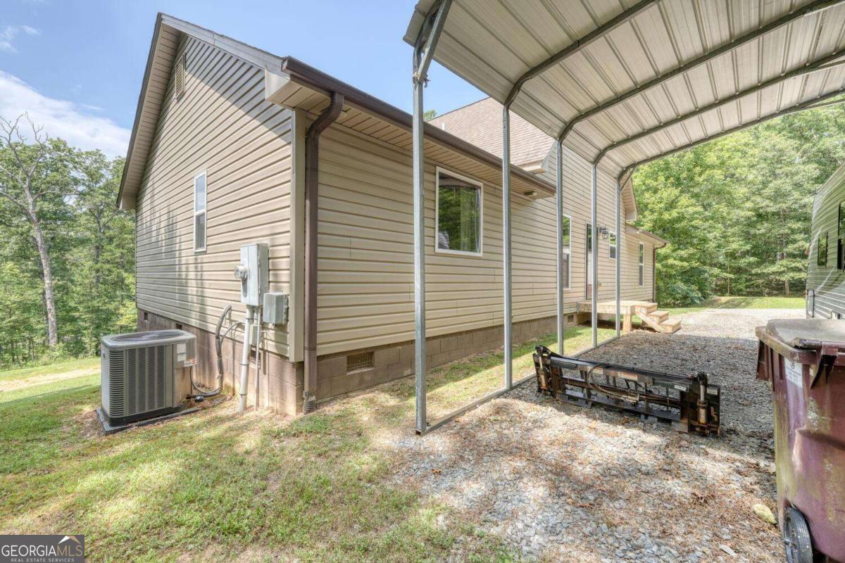 4165 Mobile Road, Unit 4 McCaysville, GA 30555 - Photo 11 of 52 a view of backyard with cabin