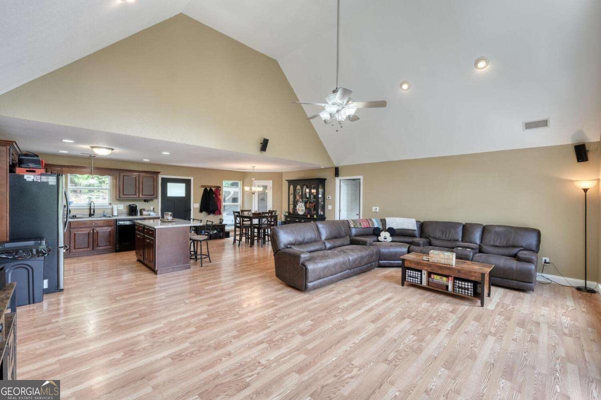 4165 Mobile Road, Unit 4 McCaysville, GA 30555 - Photo 13 of 52 a living room with furniture and wooden floor