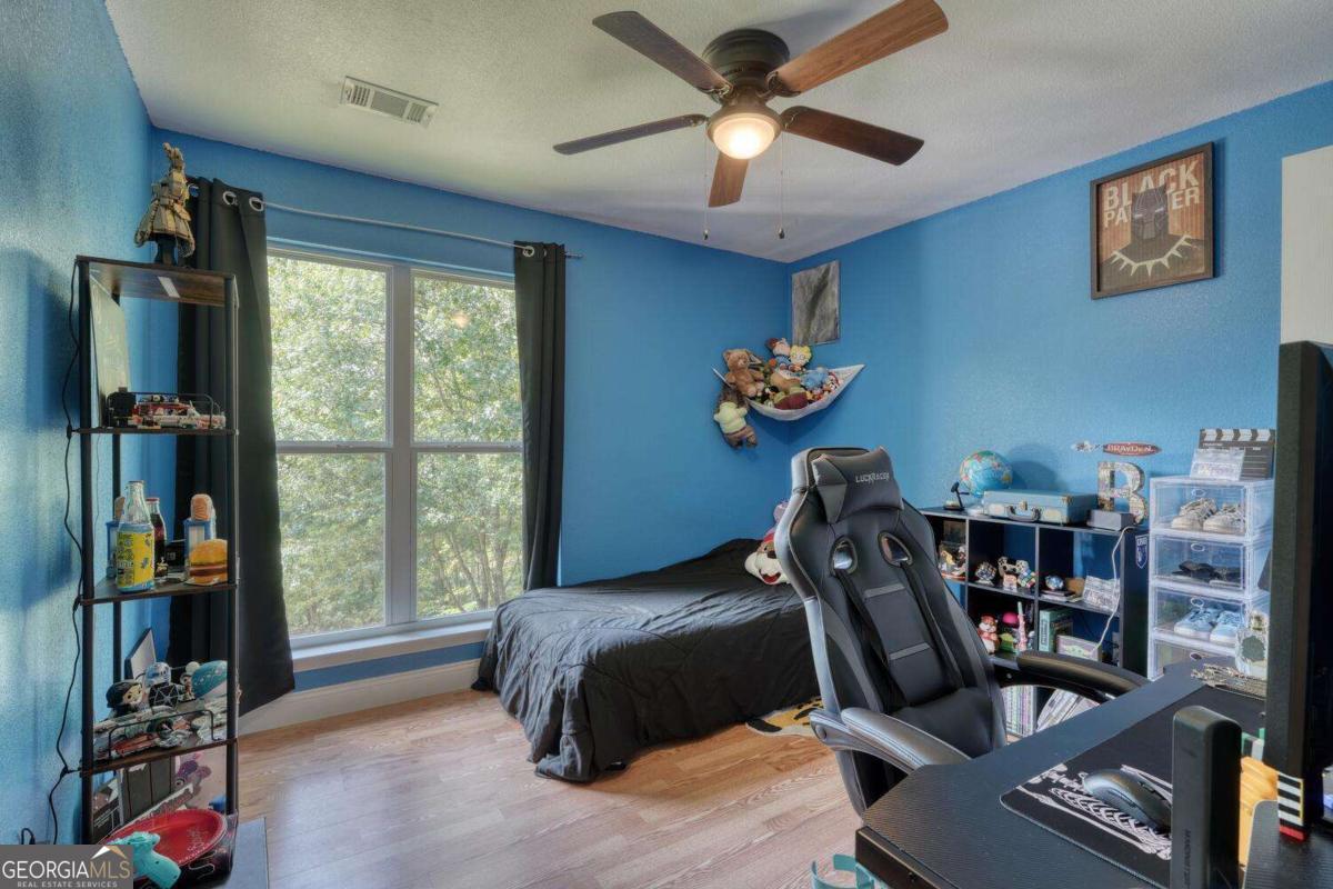 4165 Mobile Road, Unit 4 McCaysville, GA 30555 - Photo 30 of 52 a bedroom with furniture and a window