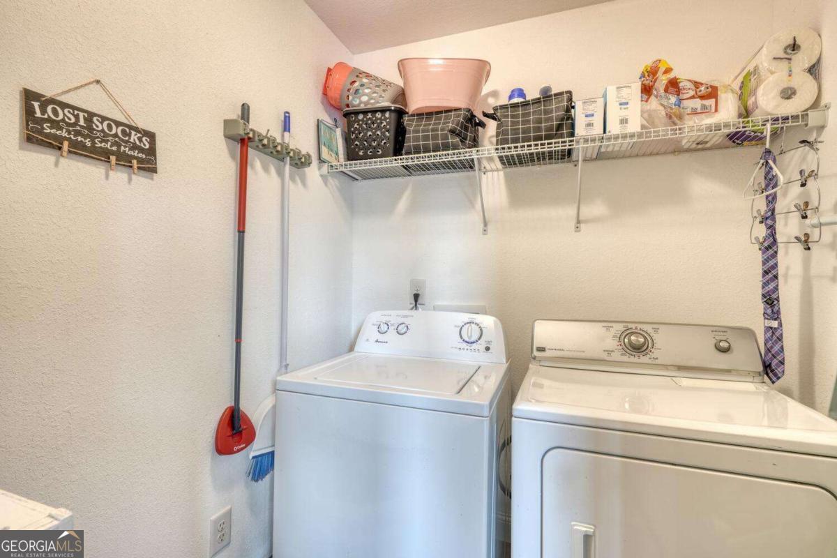 4165 Mobile Road, Unit 4 McCaysville, GA 30555 - Photo 37 of 52 a utility room with dryer and washer