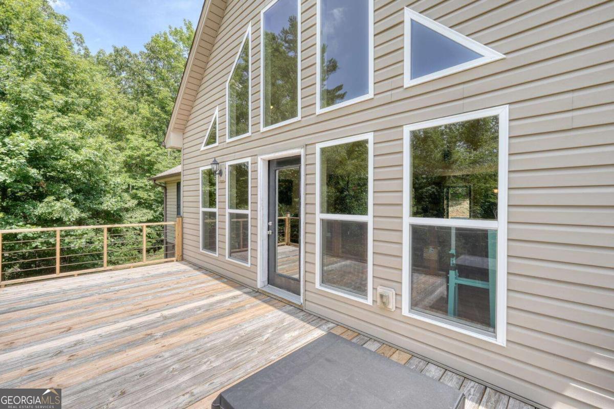 4165 Mobile Road, Unit 4 McCaysville, GA 30555 - Photo 41 of 52 a view of a house with a large window