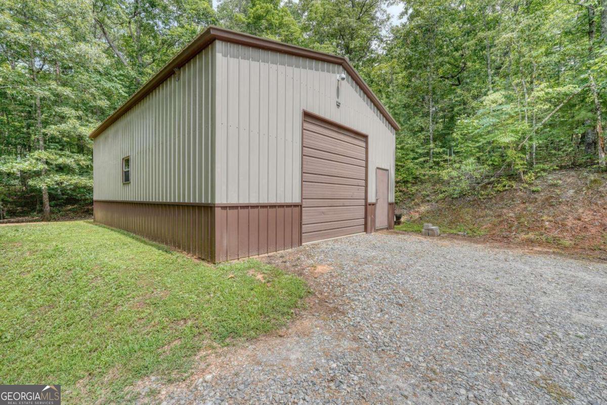 4165 Mobile Road, Unit 4 McCaysville, GA 30555 - Photo 44 of 52 a view of a house with backyard