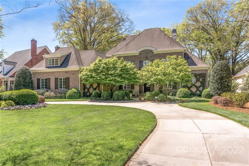 2226 Vernon Drive Charlotte, NC 28211 - Photo 1 of 44 a front view of a house with garden