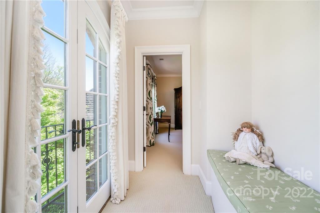 2226 Vernon Drive Charlotte, NC 28211 - Photo 23 of 44 a en suite bathroom with a granite countertop sink and a mirror