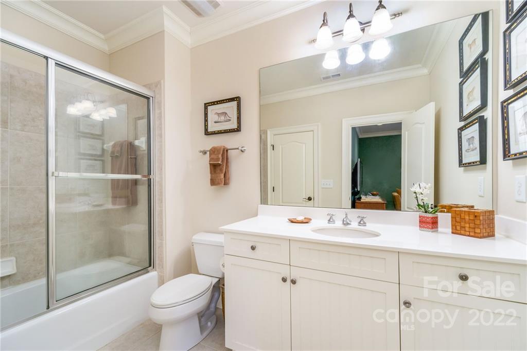 2226 Vernon Drive Charlotte, NC 28211 - Photo 30 of 44 a bathroom with a sink a toilet and shower