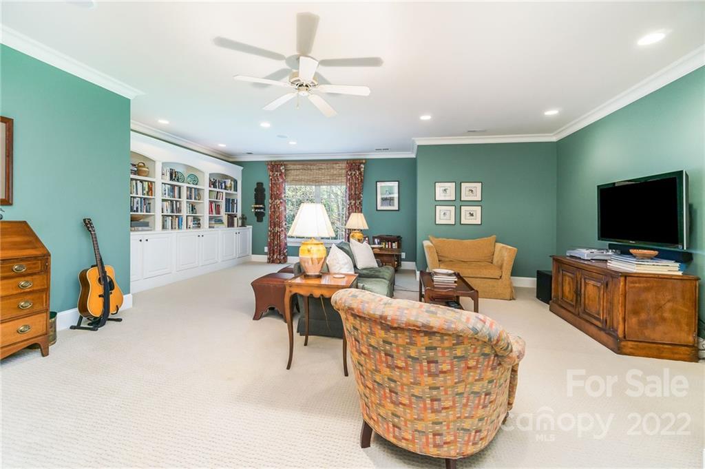 2226 Vernon Drive Charlotte, NC 28211 - Photo 31 of 44 a living room with furniture and a flat screen tv