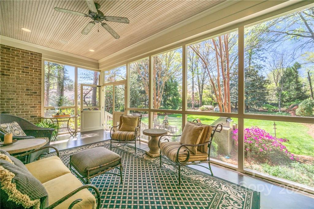 2226 Vernon Drive Charlotte, NC 28211 - Photo 38 of 44 a living room with a floor to ceiling window and furniture