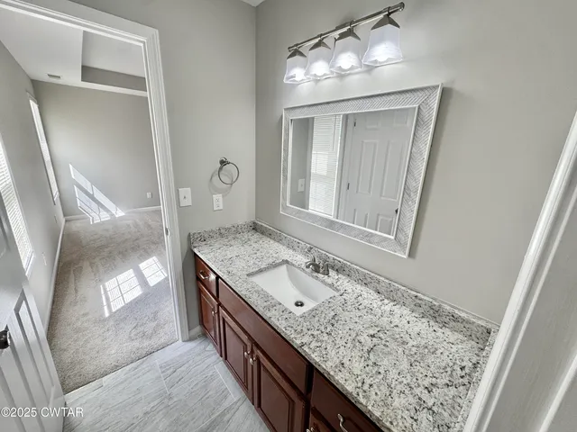 a bathroom with a shower and a toilet