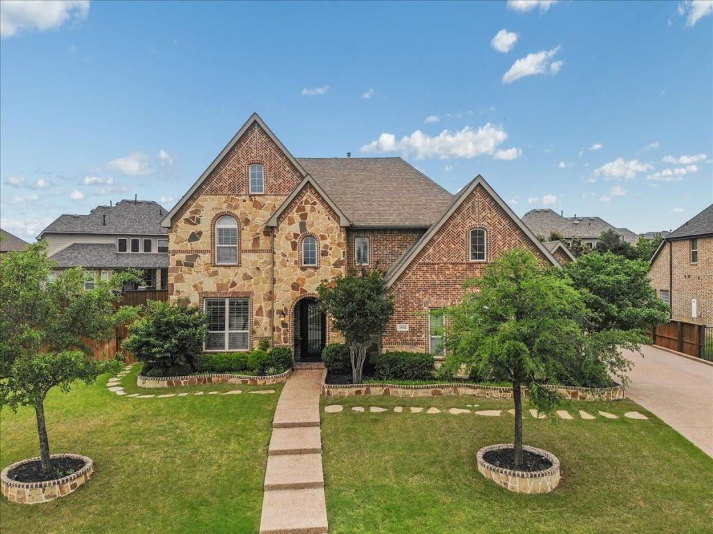 2832 Mona Vale Road Trophy Club, TX 76262 - Photo 1 of 37 a front view of a house with a yard