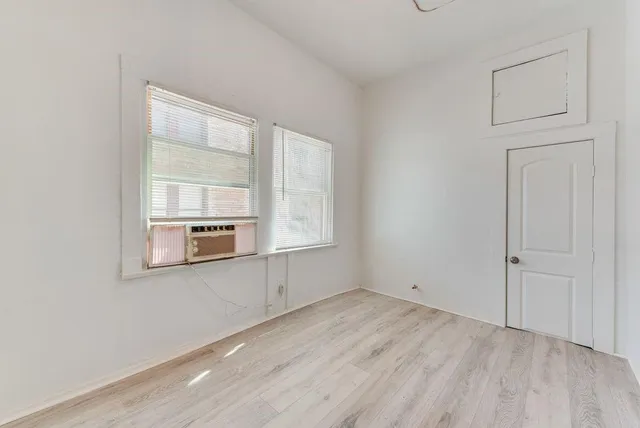 an empty room with a window