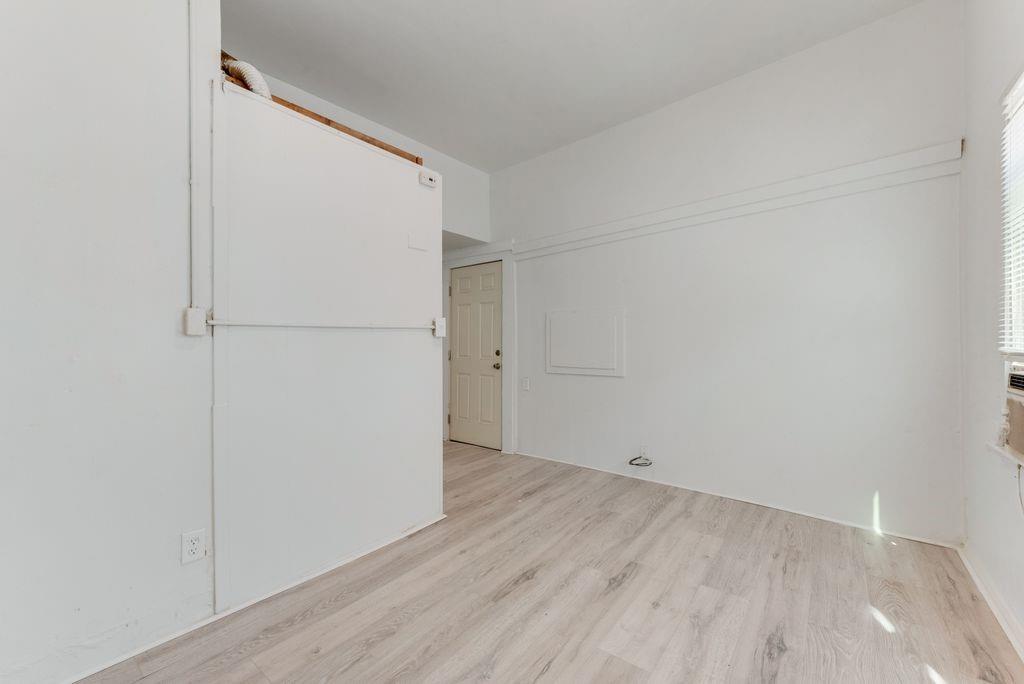 1615 Alston Avenue, Unit C Fort Worth, TX 76104 - Photo 3 of 10 a view of small space with wooden floor