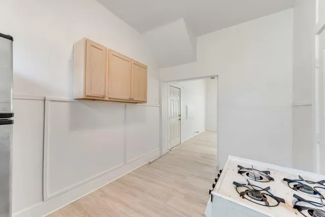 a view of a livingroom with wooden floor