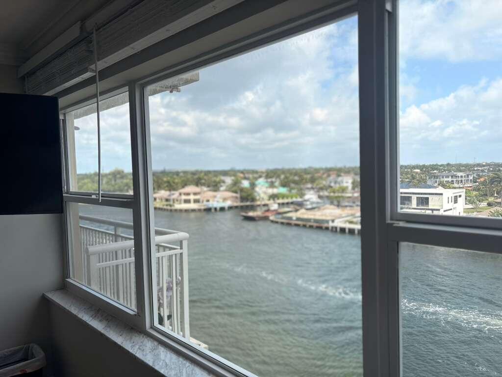 2611 North Riverside Drive, Unit 703 Pompano Beach, FL 33062 - Photo 61 of 81 a view of a lake from a window