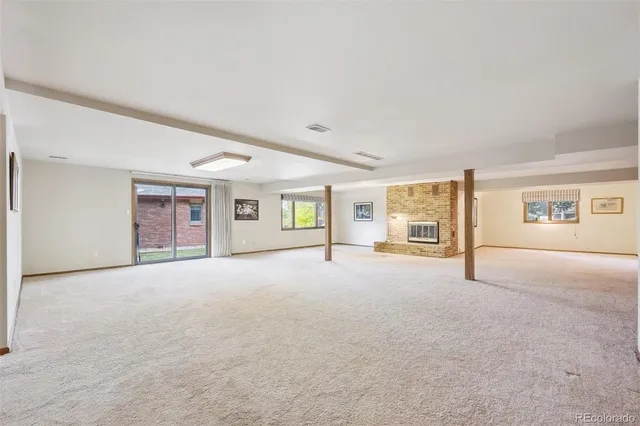 a view of an empty room with a cabinet