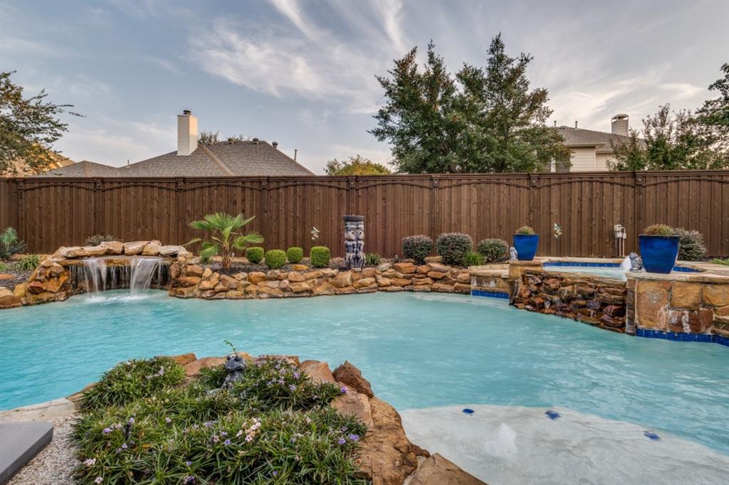 2810 Baker Street Sachse, TX 75048 - Photo 26 of 26 View of pool with a fenced backyard, a pool with connected hot tub, and a patio area