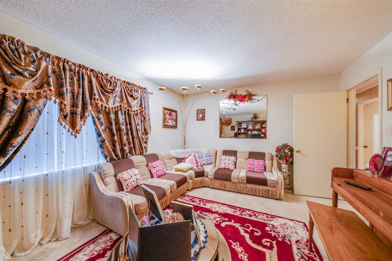 720 Bayard Road Durham, NC 27703 - Photo 11 of 28 a living room with furniture and a rug