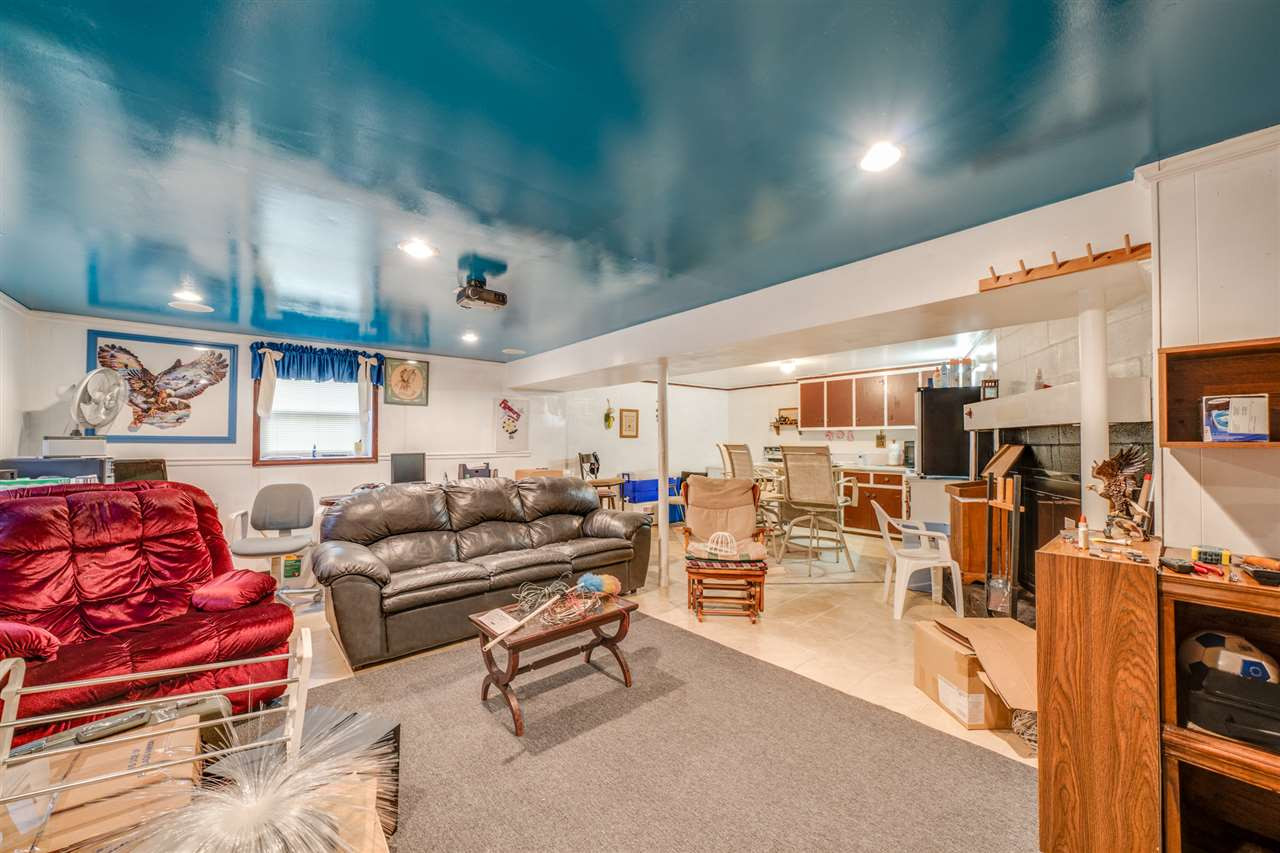 720 Bayard Road Durham, NC 27703 - Photo 20 of 28 a living room with lots of furniture and view of kitchen