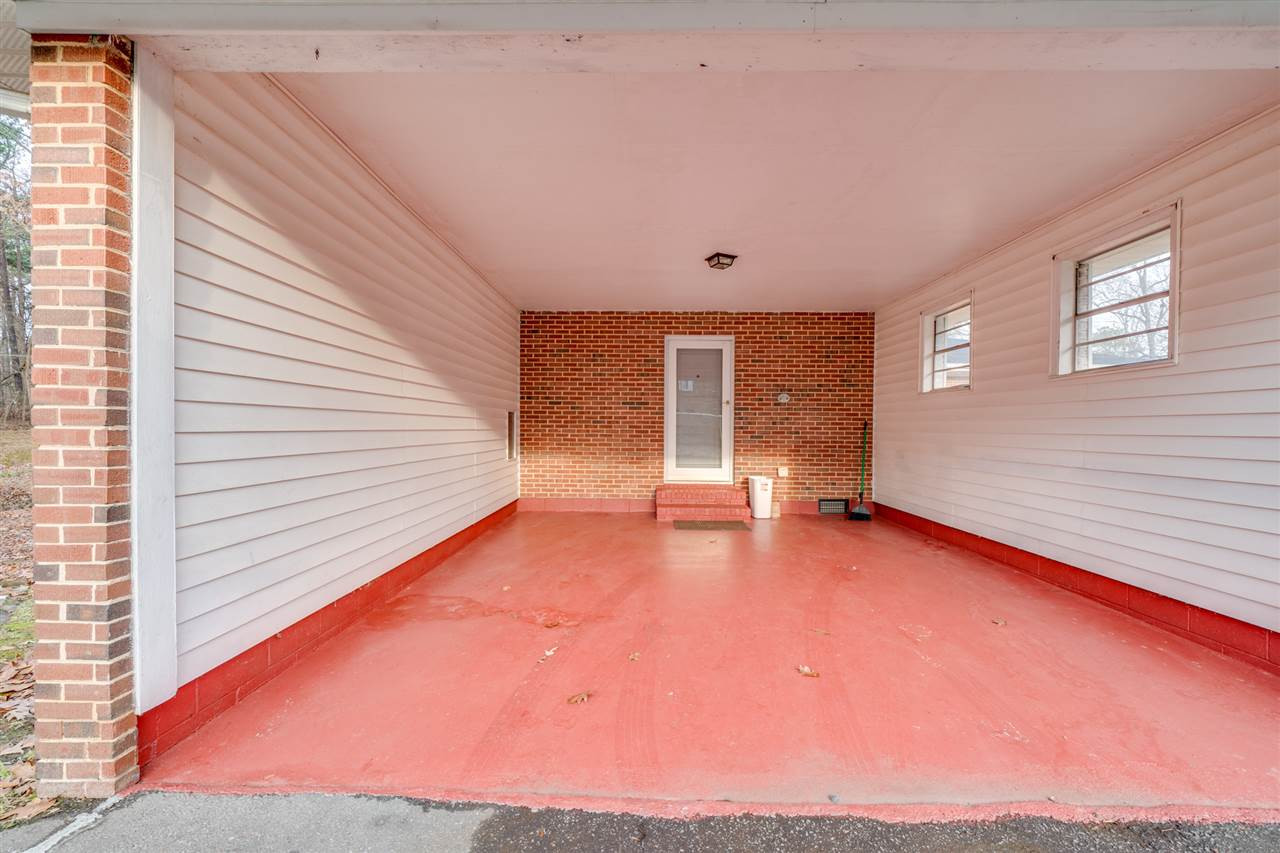 720 Bayard Road Durham, NC 27703 - Photo 4 of 28 a view of an empty room with a window