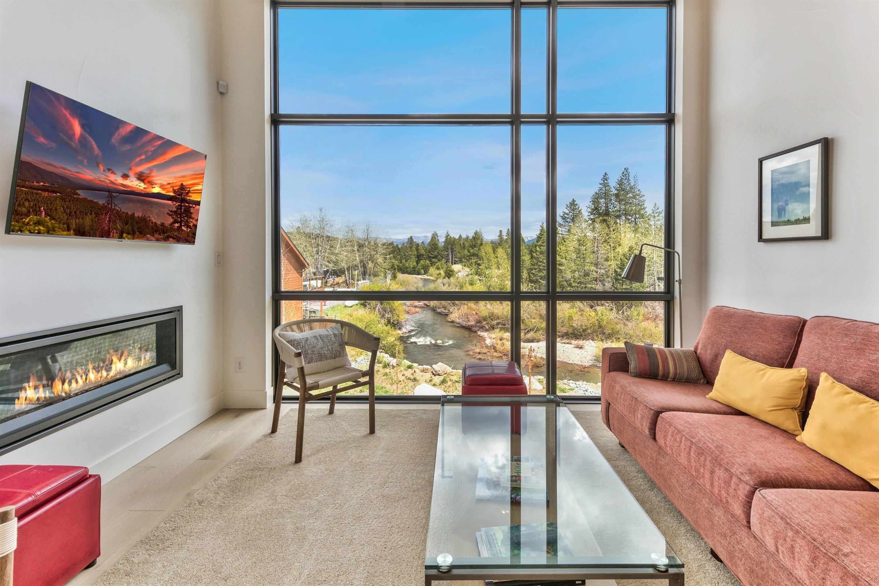 12869 Ice House Loop Truckee, CA 96161 - Photo 12 of 21 a living room with furniture and a floor to ceiling window