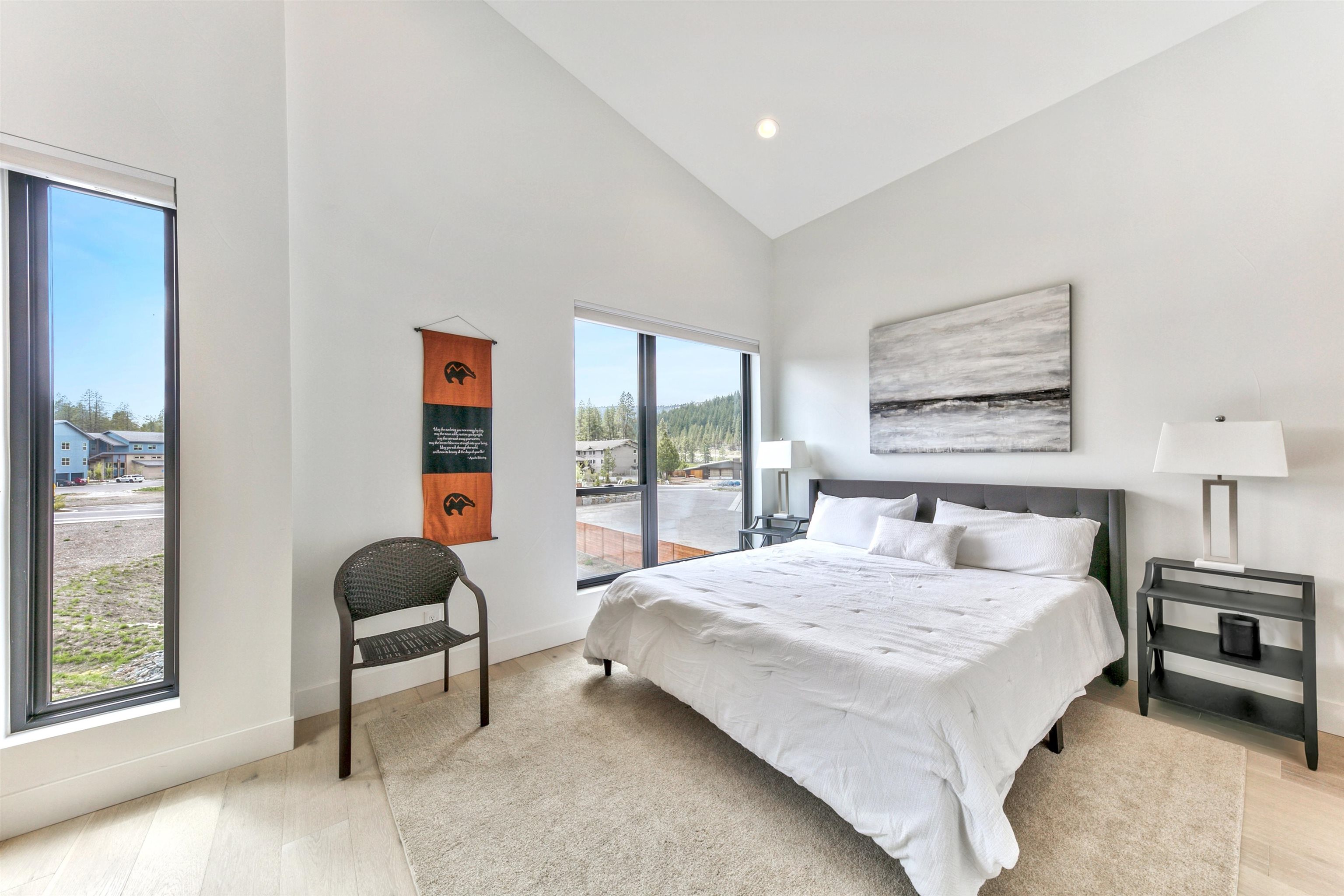 12869 Ice House Loop Truckee, CA 96161 - Photo 18 of 21 a bedroom with a bed a table and a window