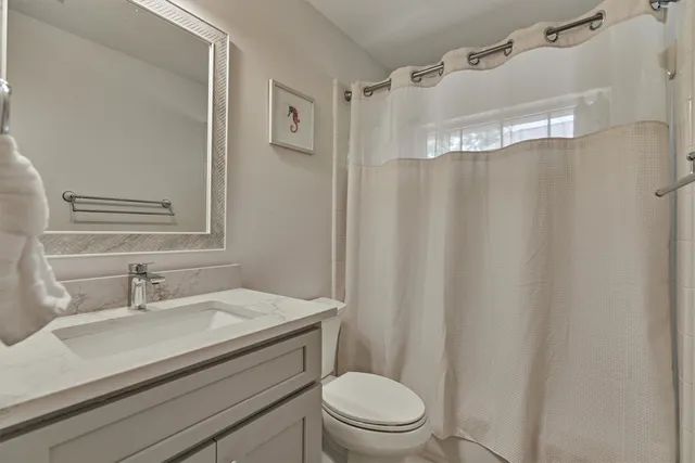 a front view of a house with a garage