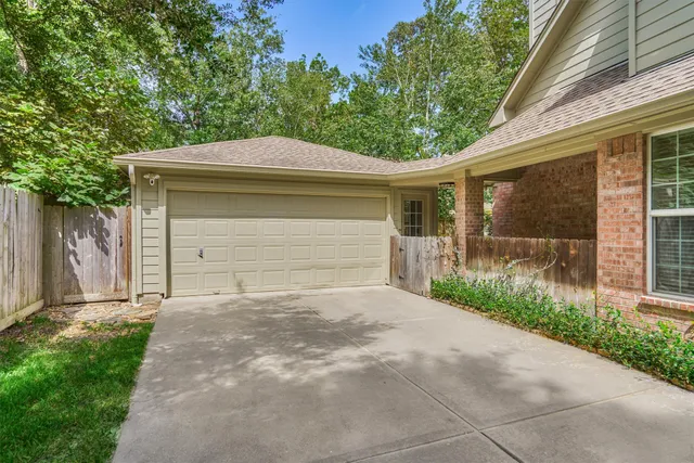 a view of a table and chairs under an umbrella