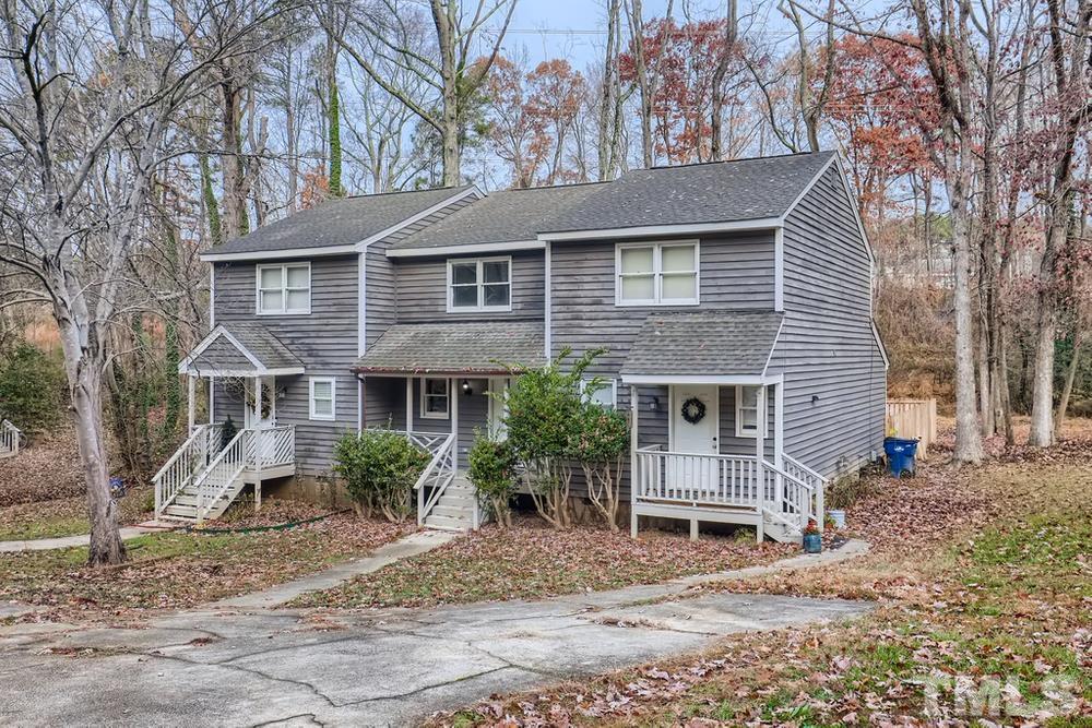 5604 Thea Lane, Unit B Raleigh, NC 27606 - Photo 2 of 27 a front view of a house with garden