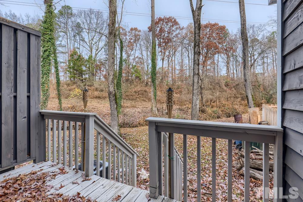 5604 Thea Lane, Unit B Raleigh, NC 27606 - Photo 24 of 27 a view of a balcony with furniture