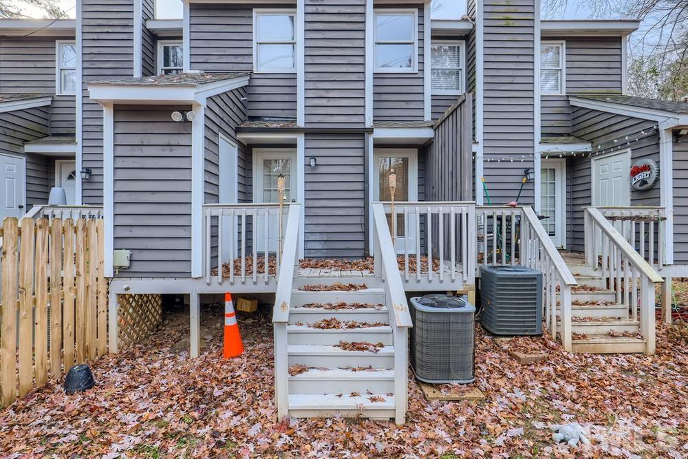 5604 Thea Lane, Unit B Raleigh, NC 27606 - Photo 25 of 27 a front view of a house with stairs