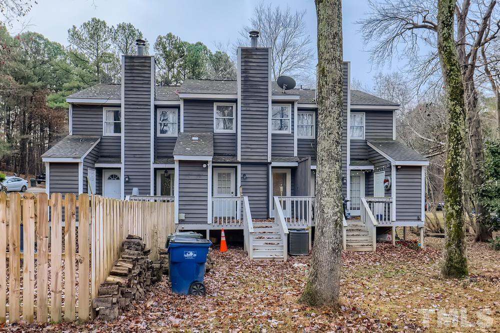 5604 Thea Lane, Unit B Raleigh, NC 27606 - Photo 26 of 27 front view of a house with a fence