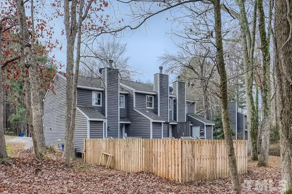 5604 Thea Lane, Unit B Raleigh, NC 27606 - Photo 27 of 27 a view of a house with a yard