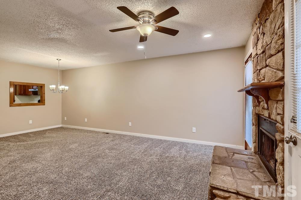 5604 Thea Lane, Unit B Raleigh, NC 27606 - Photo 8 of 27 a view of an empty room