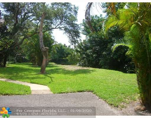 636 Northwest 13th Street, Unit 33 Boca Raton, FL 33486 - Photo 2 of 16 Exterior Front