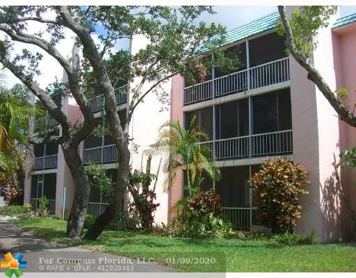 636 Northwest 13th Street, Unit 33 Boca Raton, FL 33486 - Photo 3 of 16 Exterior Front