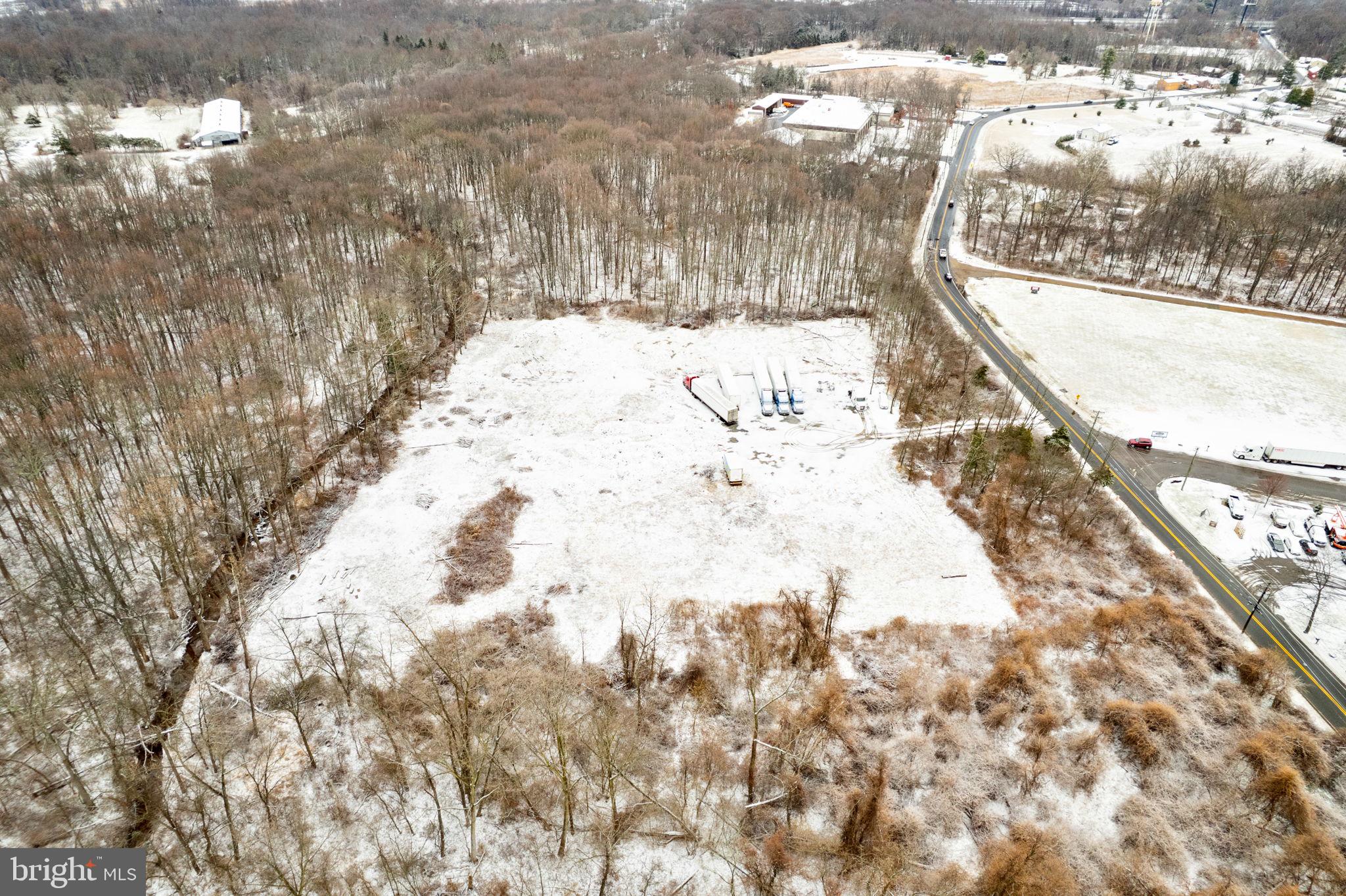 220 Bakers Basin Road Trenton, NJ 08648 - Photo 10 of 15 a view of a yard with large trees