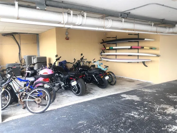 a view of a garage with a bike and a cycle