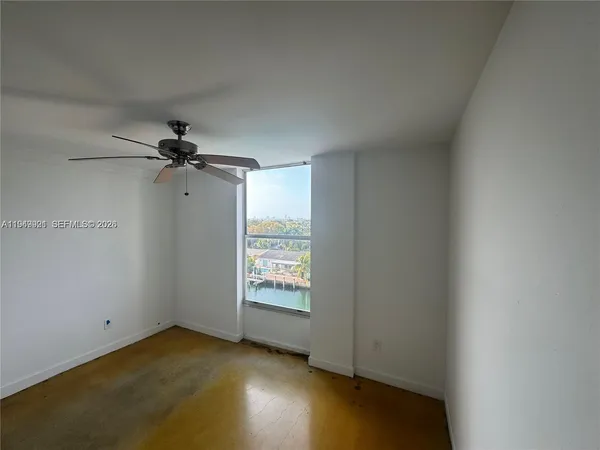 an empty room with windows