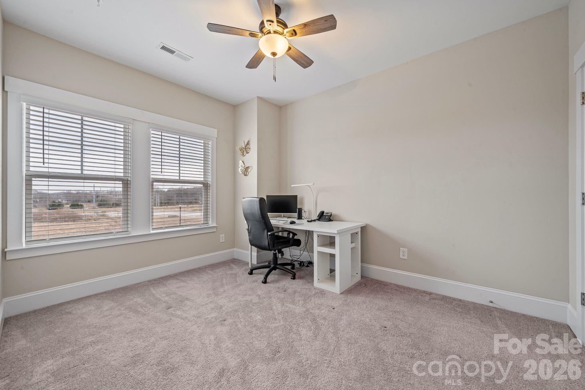 684 Dunkins Ferry Road Rock Hill, SC 29730 - Photo 17 of 32 a workspace with furniture and a window