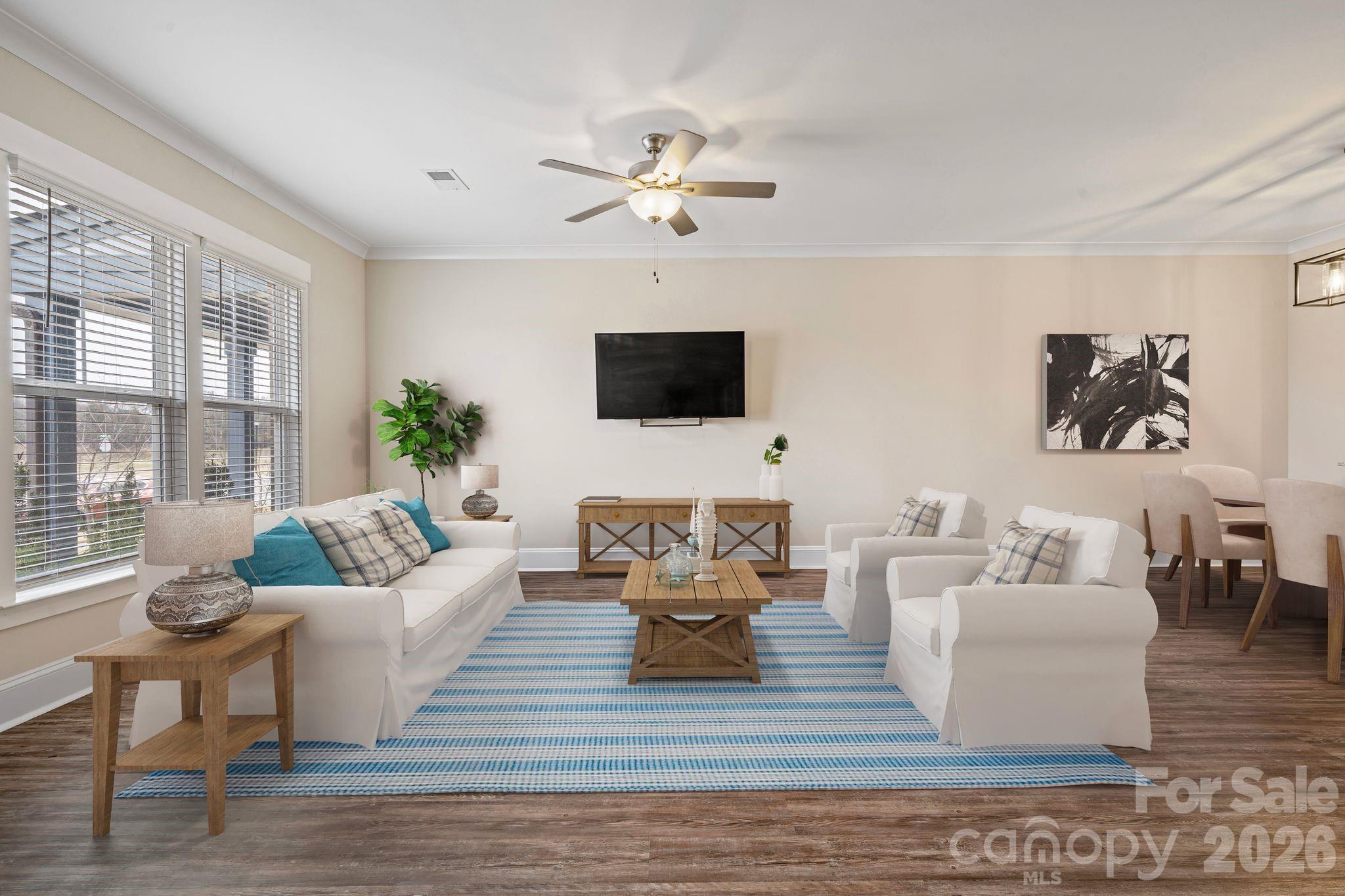 684 Dunkins Ferry Road Rock Hill, SC 29730 - Photo 4 of 32 a living room with furniture and a flat screen tv