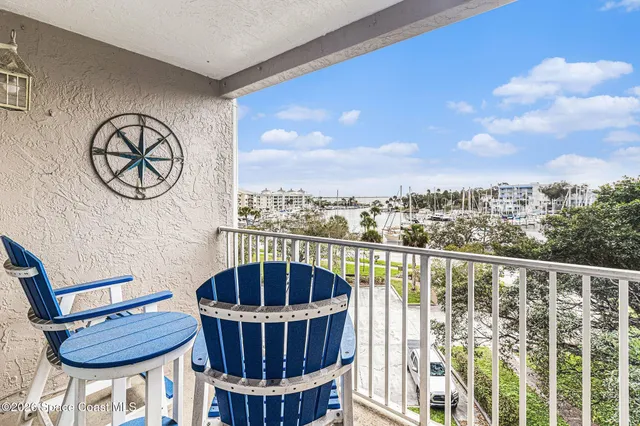 a view of balcony with furniture