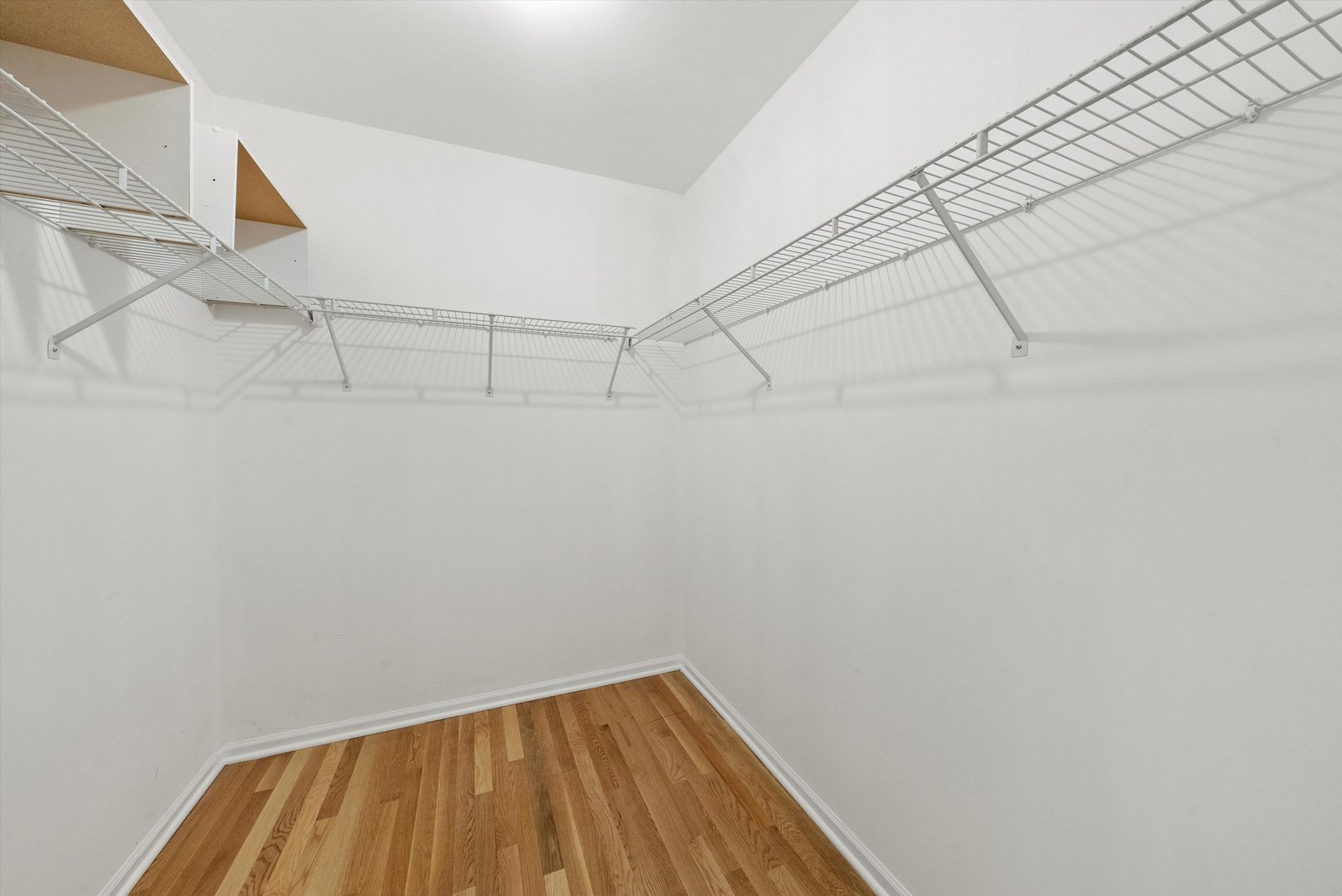 289 Ripplebrook Court Schaumburg, IL 60173 - Photo 23 of 31 a view of a room with racks on the wall