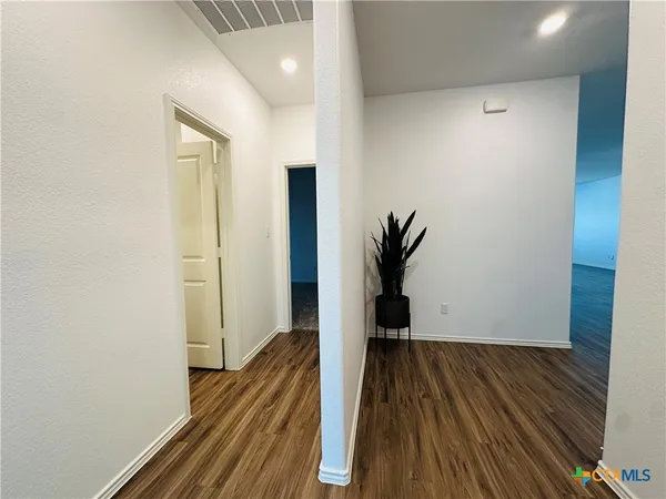 wooden floor with closet